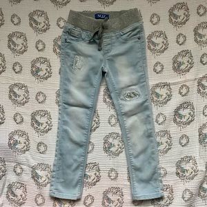 SQZ jeans. Distressed with sequin detail. Girls size 6